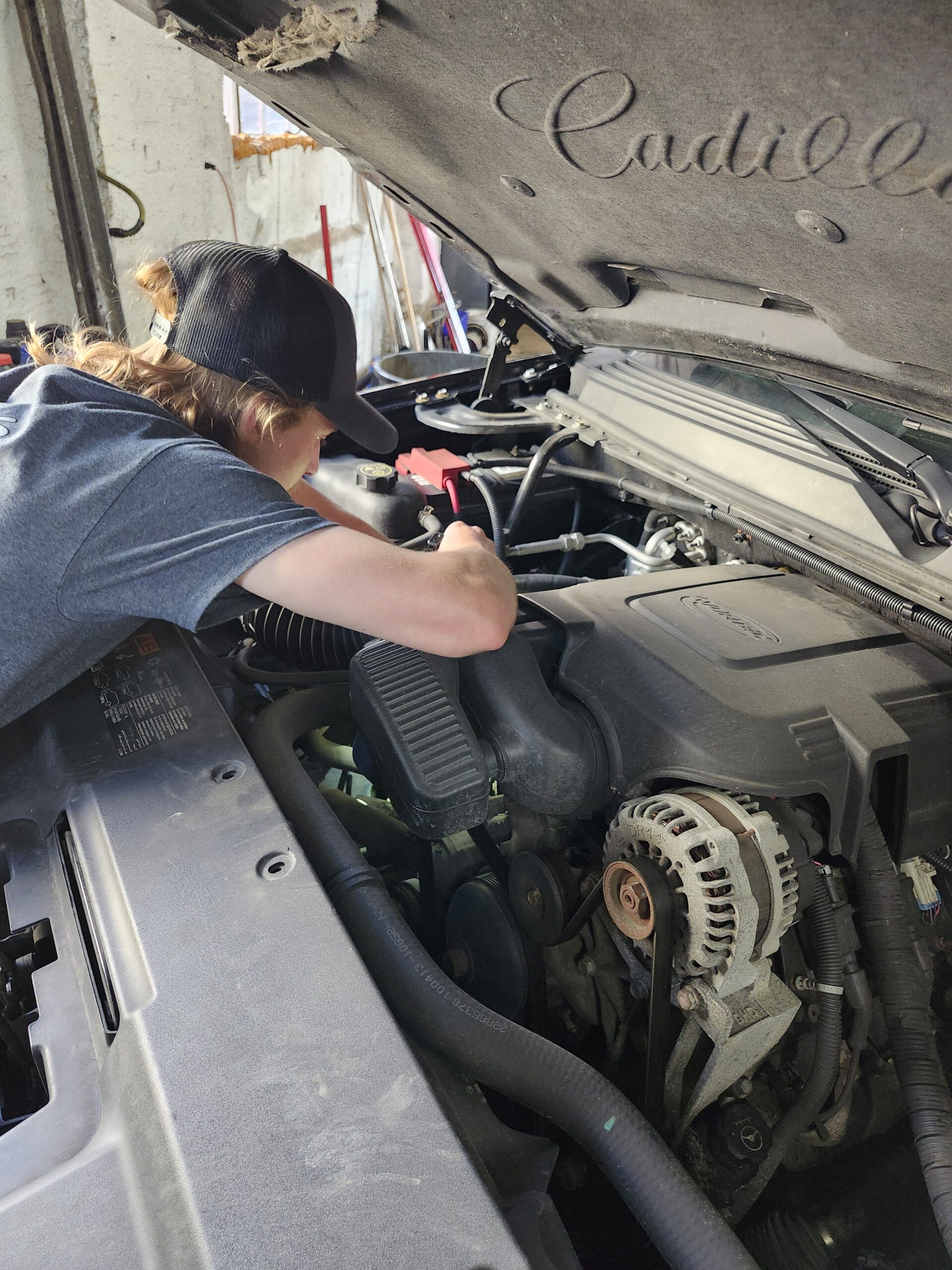Expert technician working on a car at Greer's Auto